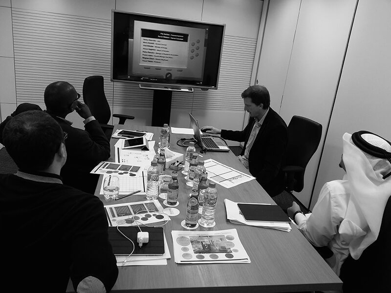 Client story HEC meeting around table
