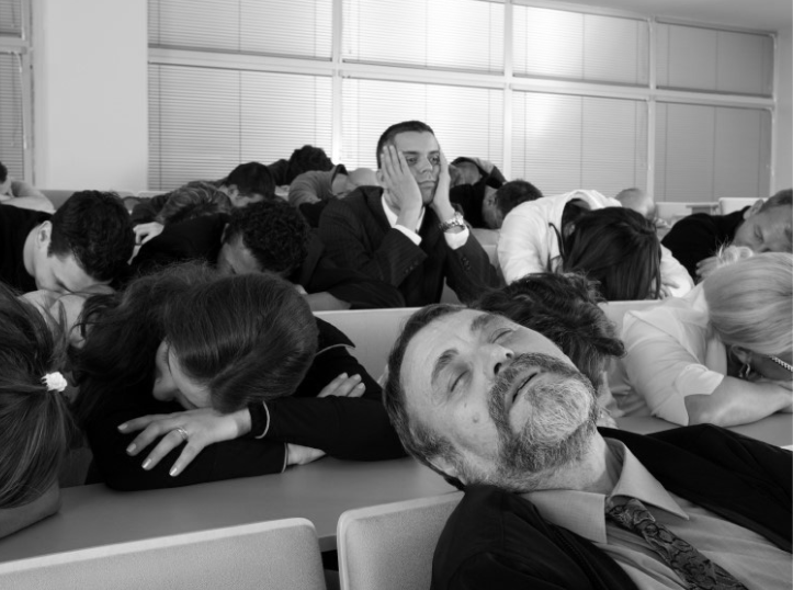 People sleeping in a meeting